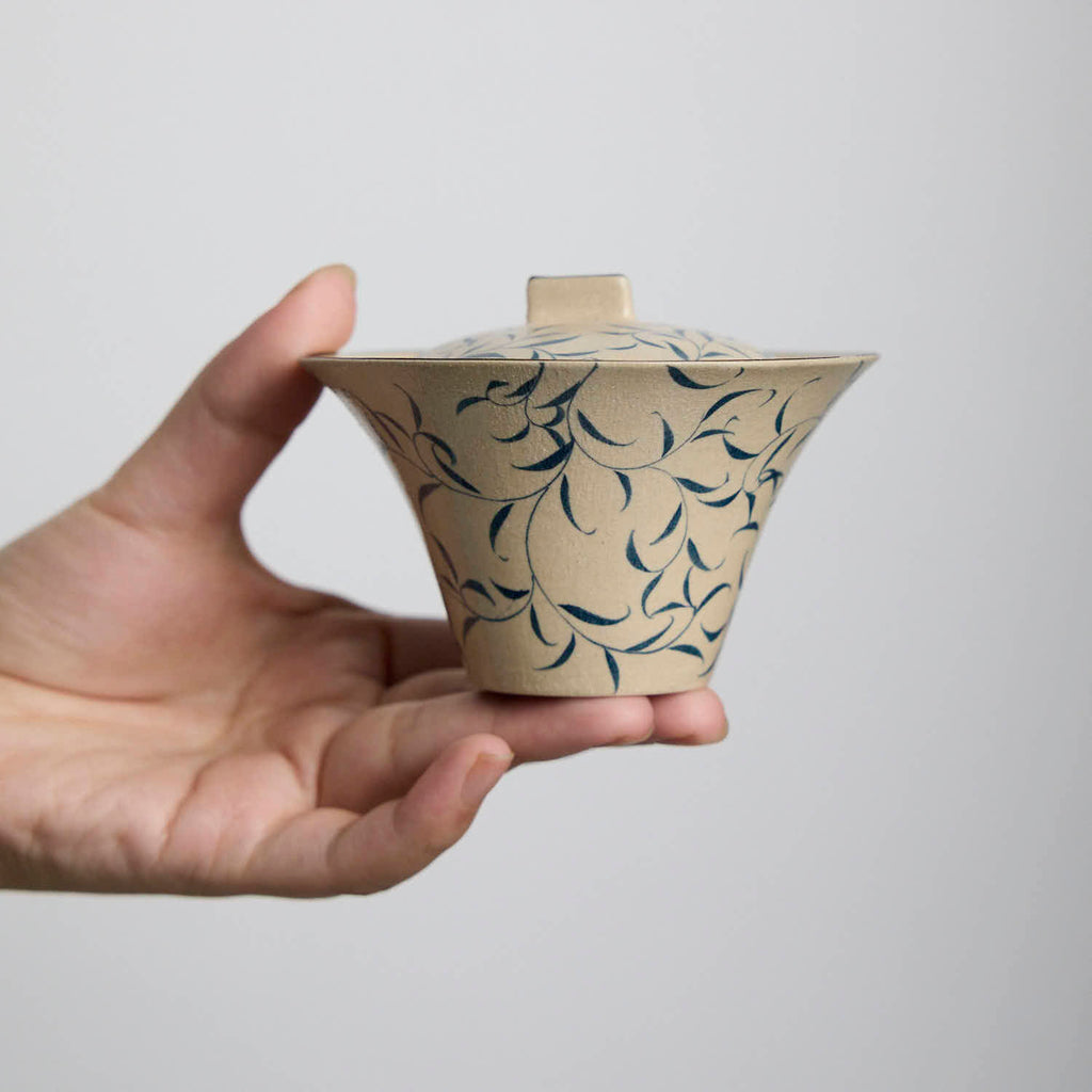 Hand-painted blue and white porcelain gaiwan with spring bud and moonlight design