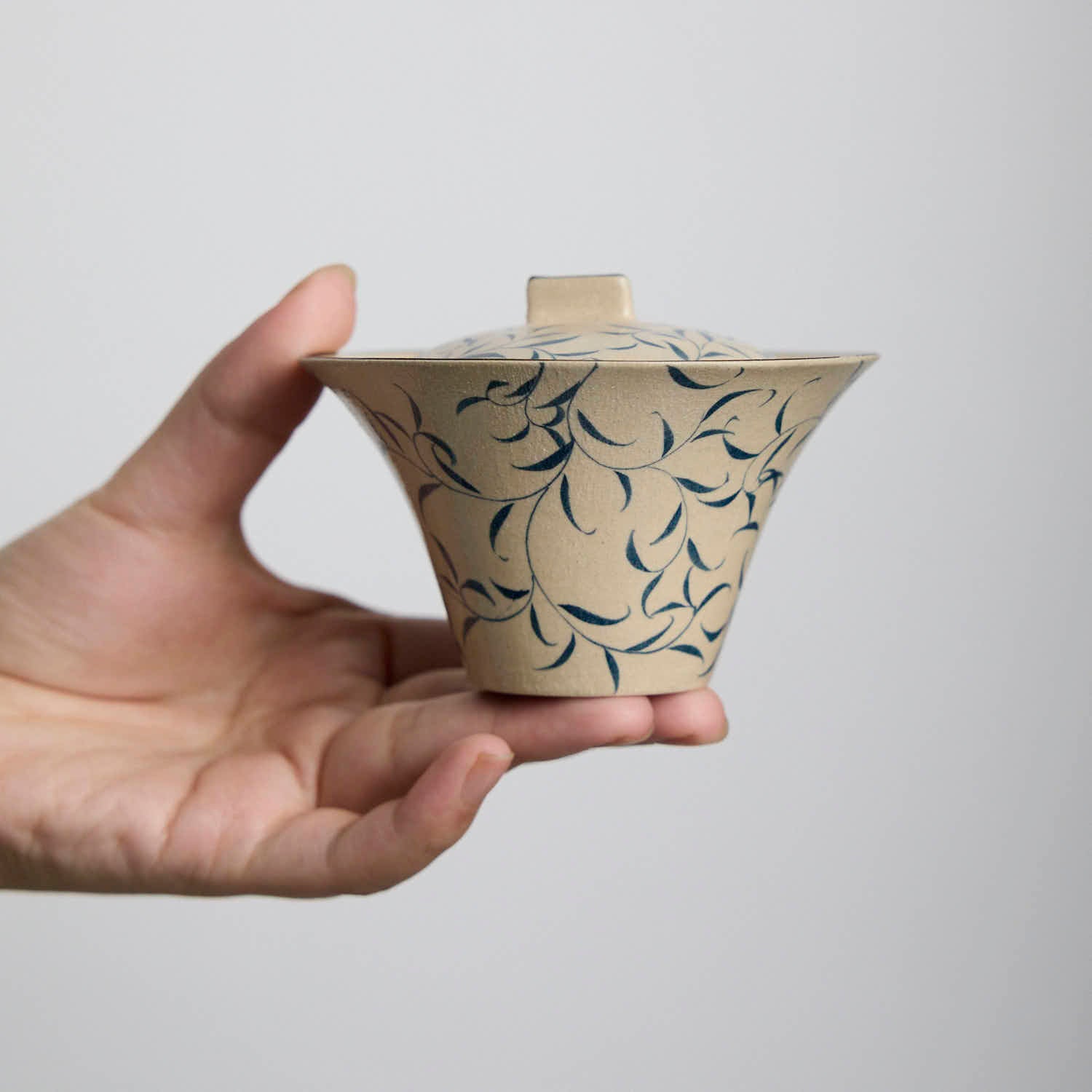 Hand-painted blue and white porcelain gaiwan with spring bud and moonlight design