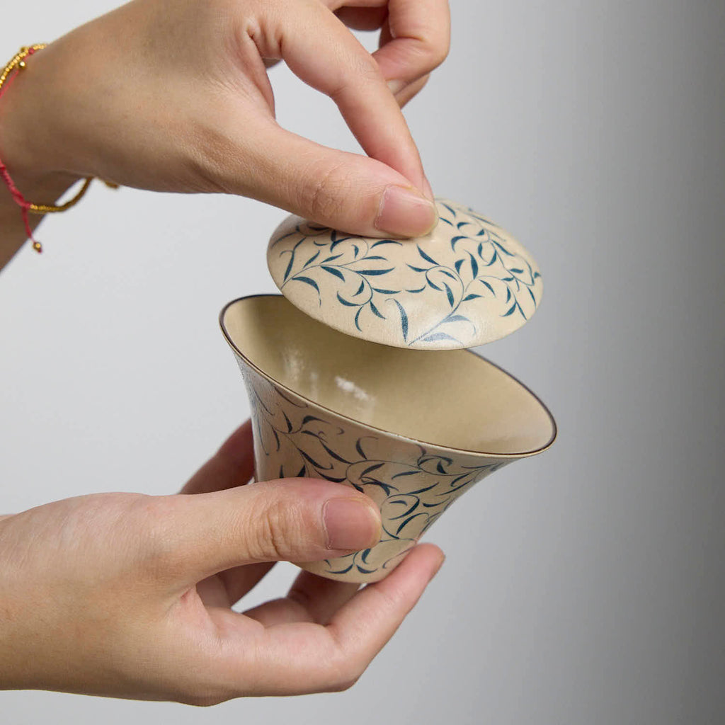 Hand-painted blue and white porcelain gaiwan with spring bud and moonlight design