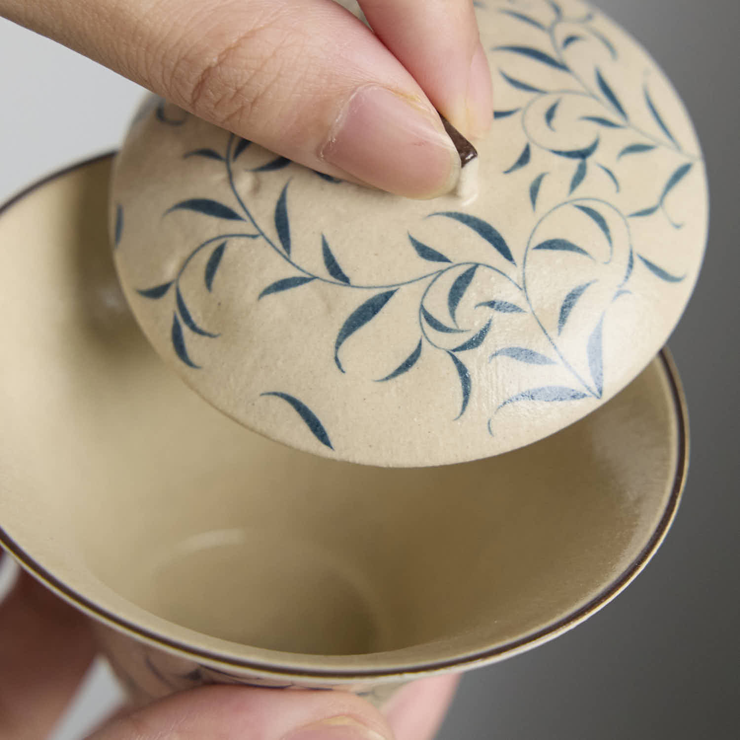 Hand-painted blue and white porcelain gaiwan with spring bud and moonlight design