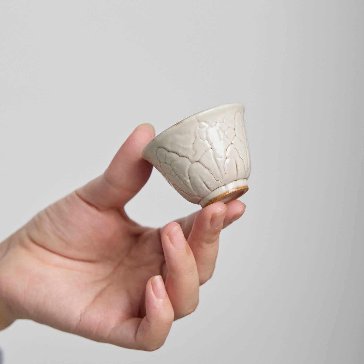 One-of-a-kind Ou Kiln cup with irregular crackle glaze texture