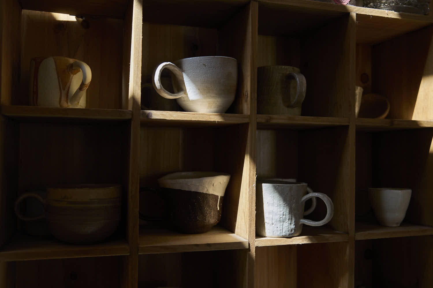 Artisan Ceramics and Handcrafted Tea Ware from RouseClay, featuring unique crackle glaze tea cups and handmade pottery.