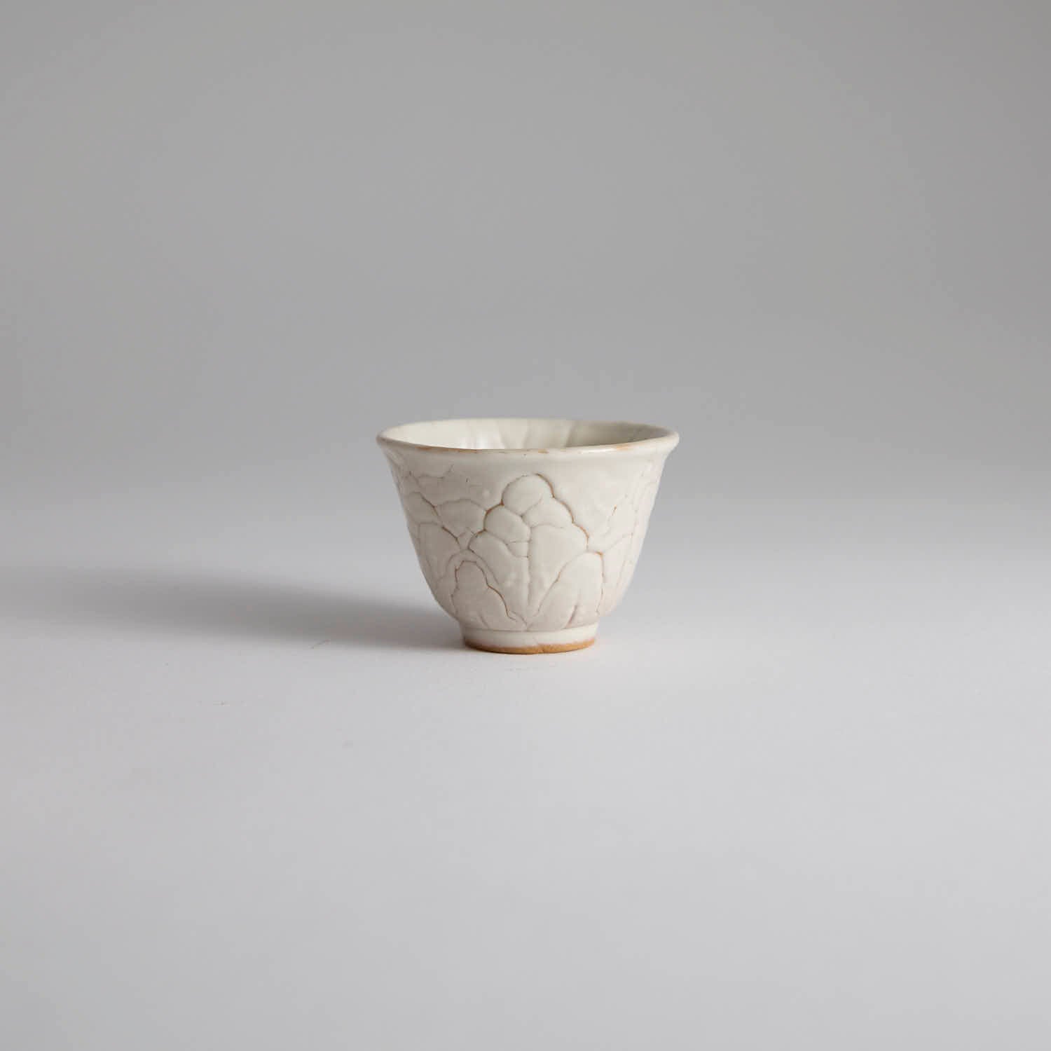 One-of-a-kind Ou Kiln cup with irregular crackle glaze texture
