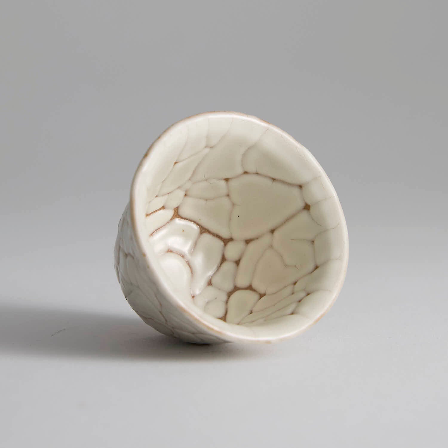 One-of-a-kind Ou Kiln cup with irregular crackle glaze texture