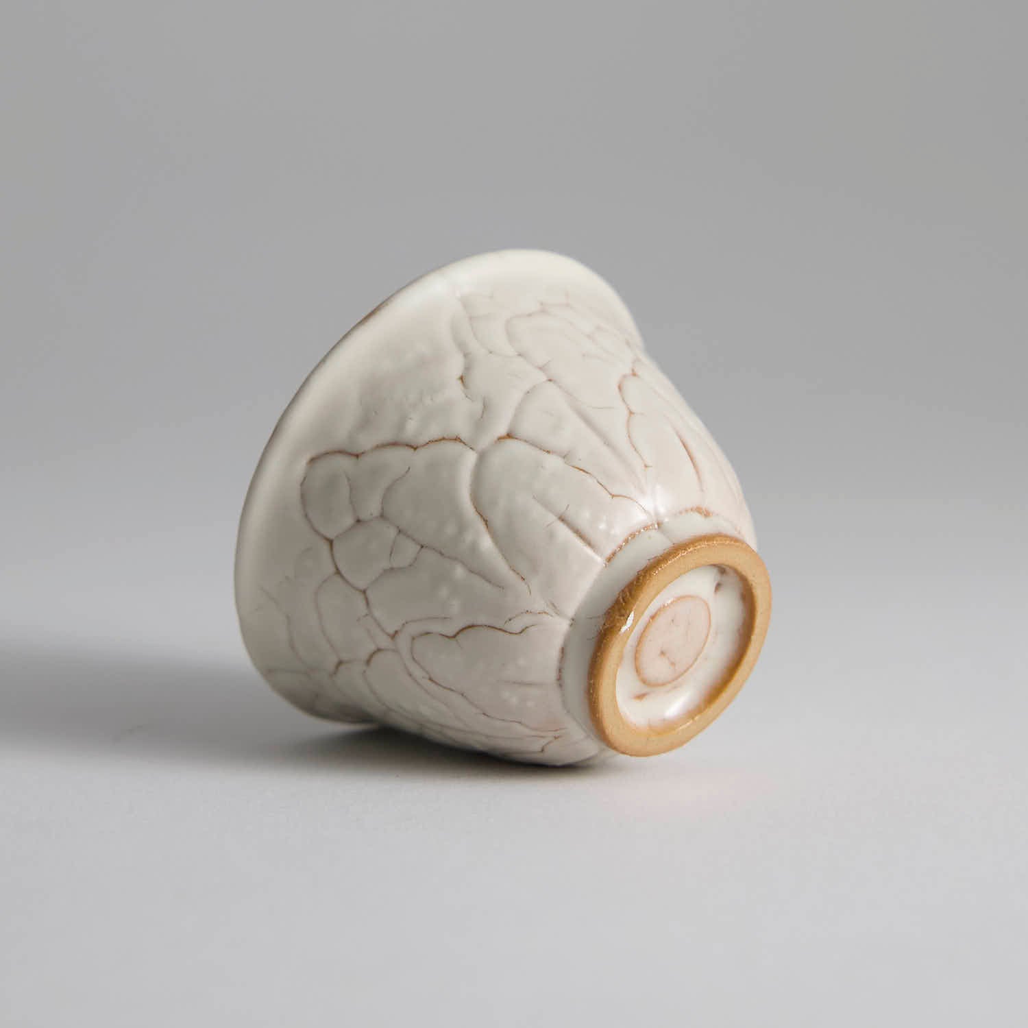 One-of-a-kind Ou Kiln cup with irregular crackle glaze texture