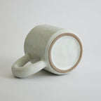 Ceramic mug with heart-shaped design and smooth finish