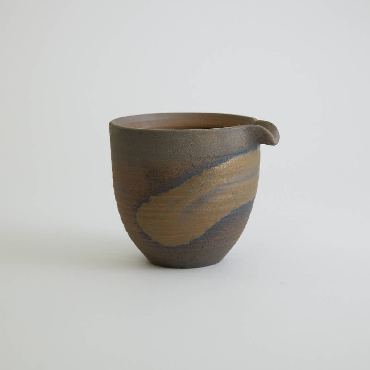 Rustic stoneware fair cup Gong Dao Bei with vintage coarse clay texture