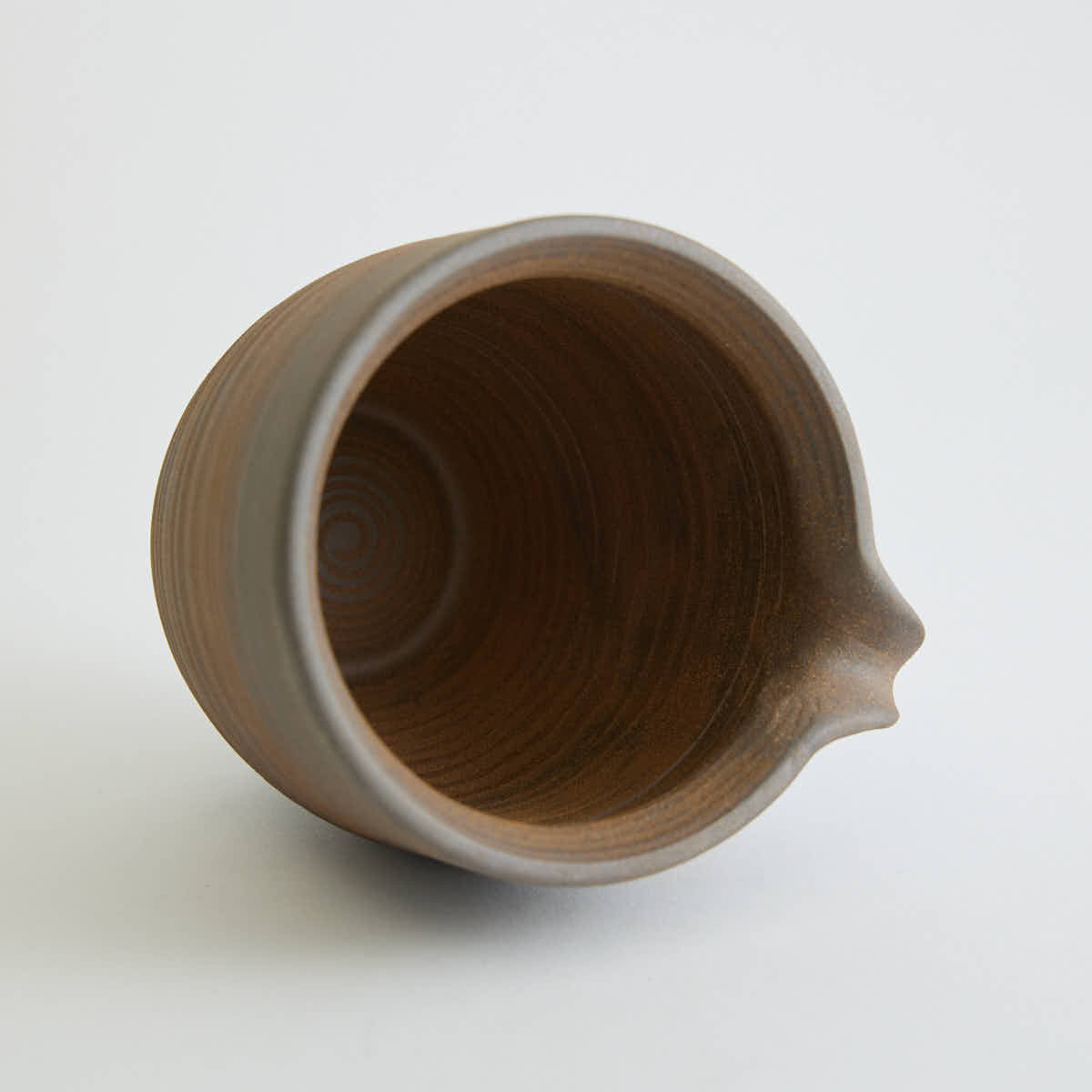 Rustic stoneware fair cup Gong Dao Bei with vintage coarse clay texture