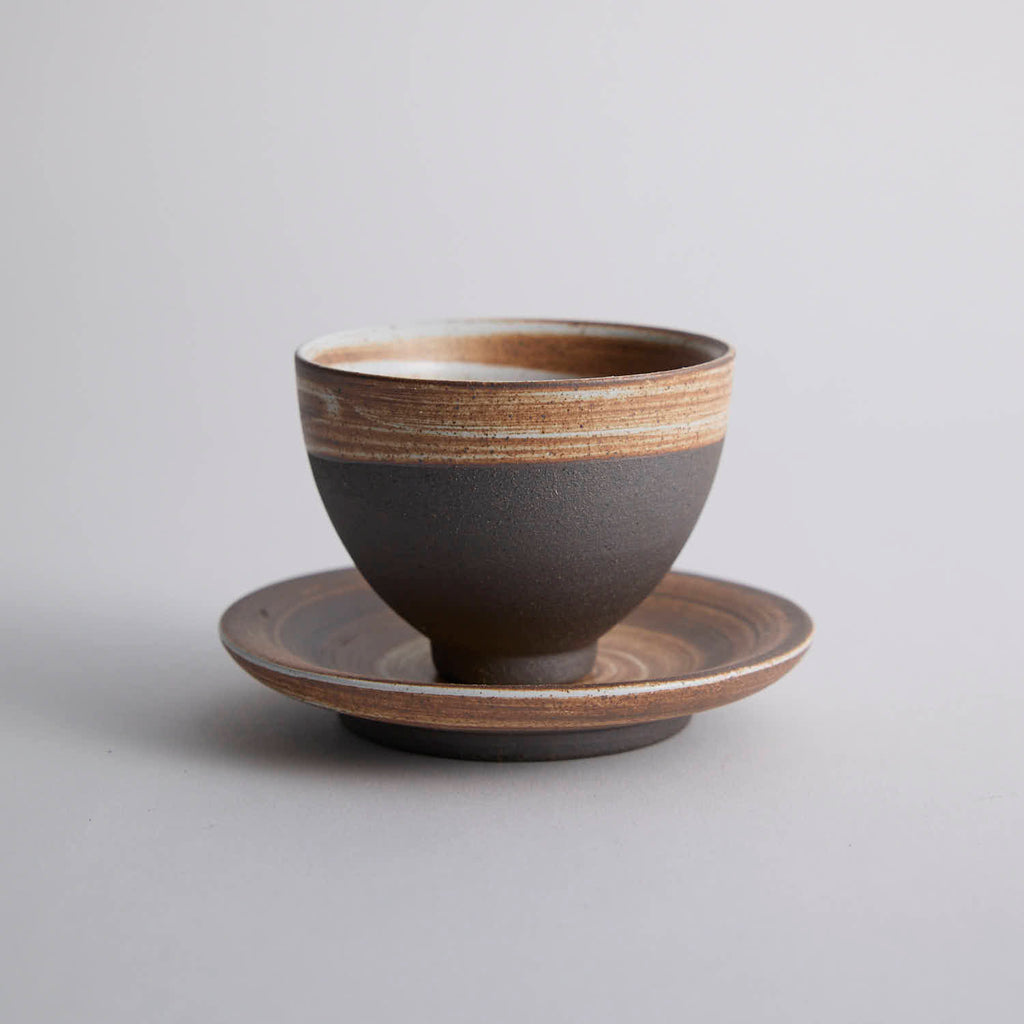 Wood-fired stoneware master cup with natural ash markings and Japanese style