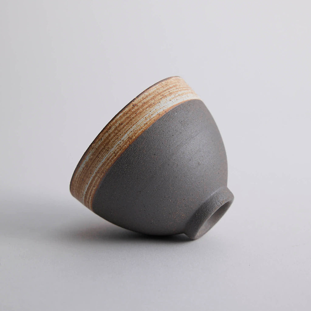 Wood-fired stoneware master cup with natural ash markings and Japanese style