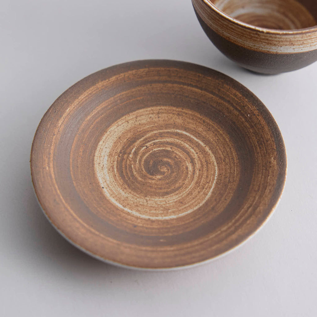 Wood-fired stoneware master cup with natural ash markings and Japanese style