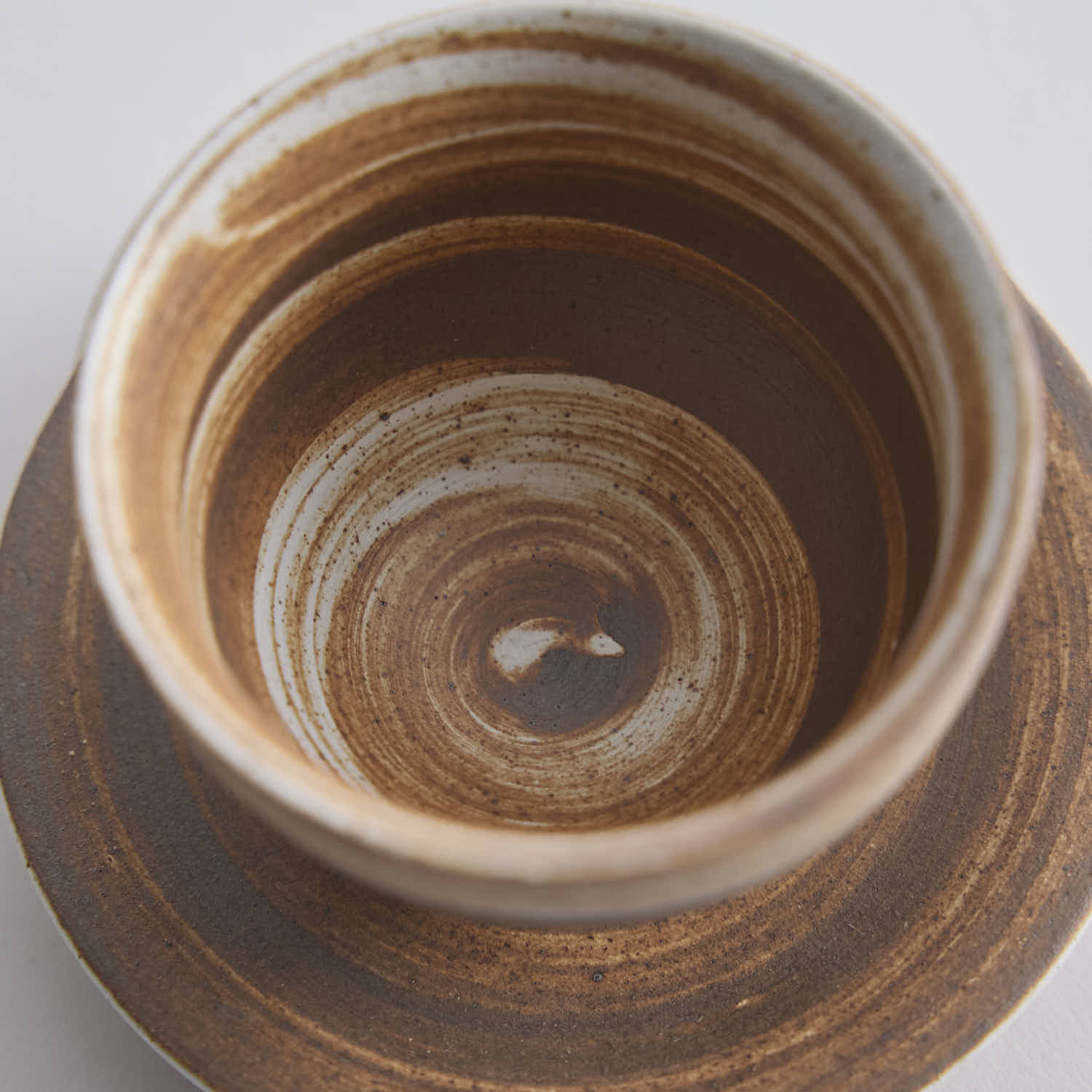 Wood-fired stoneware master cup with natural ash markings and Japanese style