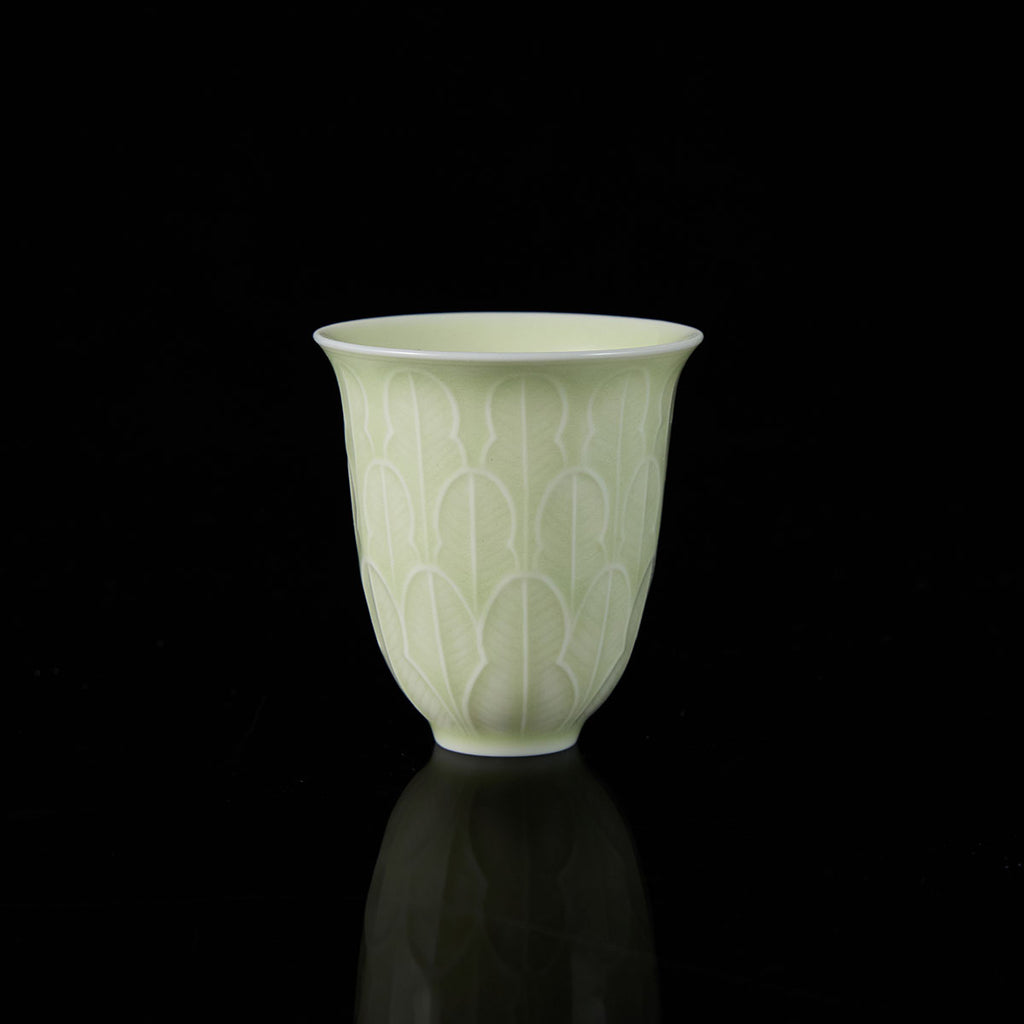 Banana Leaf Celadon Cup with Cabbage Relief and Hidden Cat Motif

