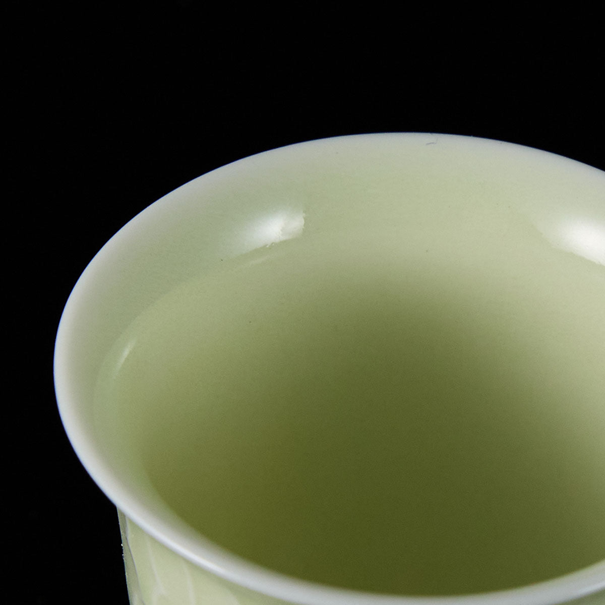 Banana Leaf Celadon Cup with Cabbage Relief and Hidden Cat Motif
