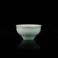 Ou Kiln open-rim celadon teacup with a smooth jade-like glaze and minimalist bowl-shaped design.