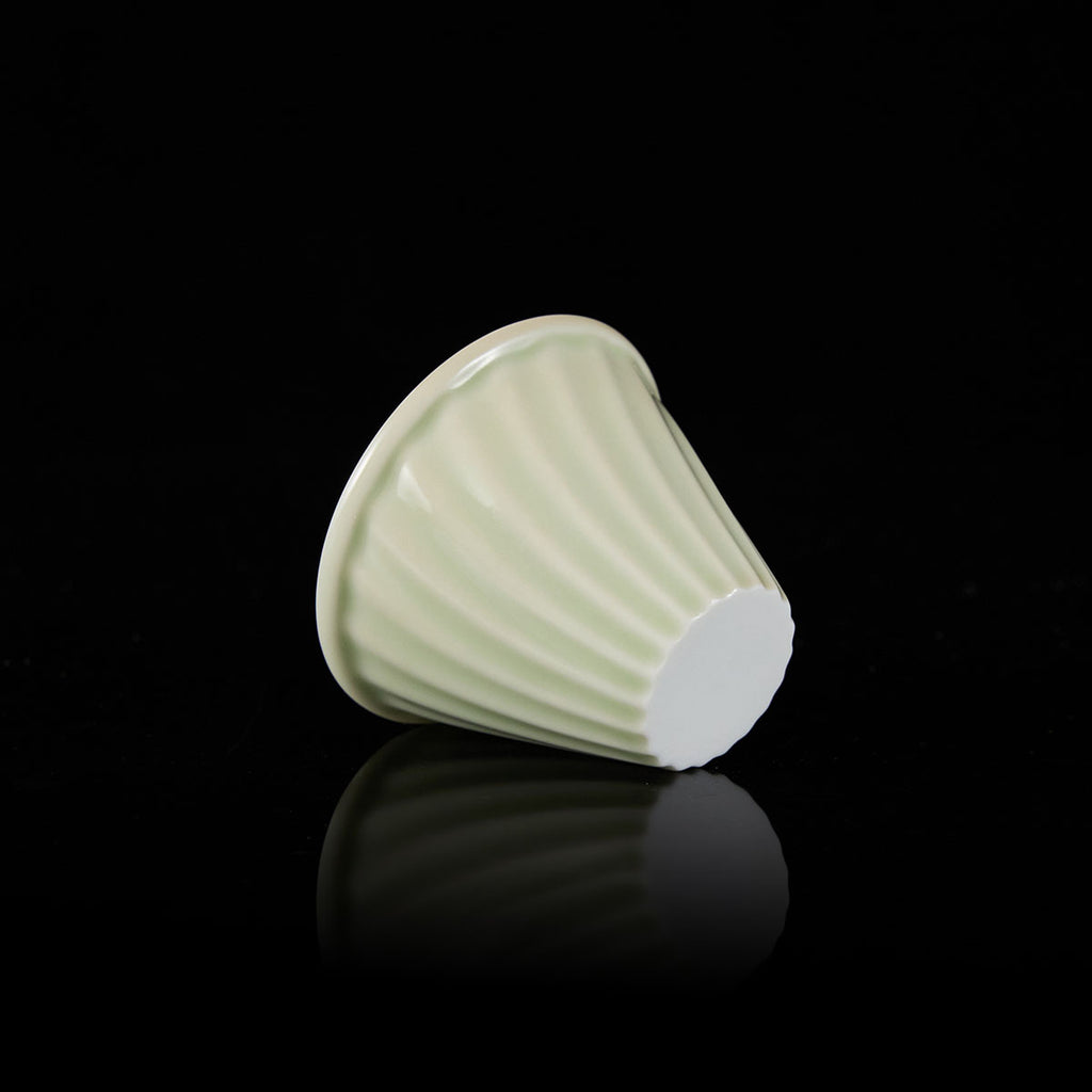 Celadon Ou Kiln Wave-Carved Teacup with flowing ripple pattern