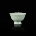 Handcrafted Linghua Blossom Teacup with outward flare and inward waist