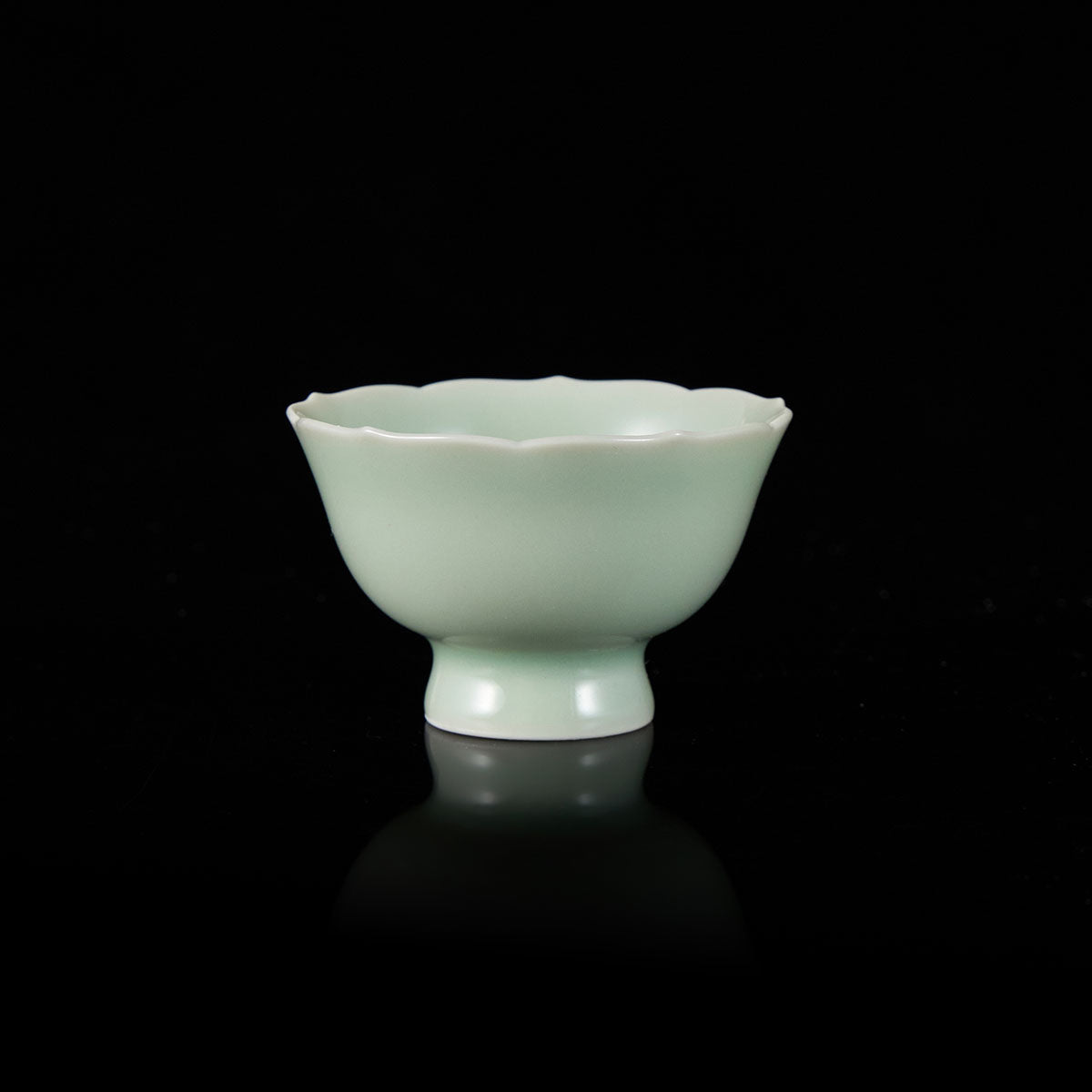 Handcrafted Linghua Blossom Teacup with outward flare and inward waist