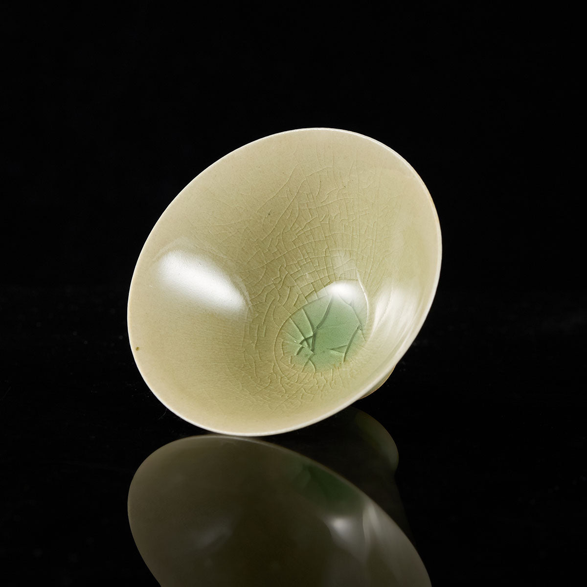 Handmade crackle-glaze Doulifa teacup with flared rim and small foot