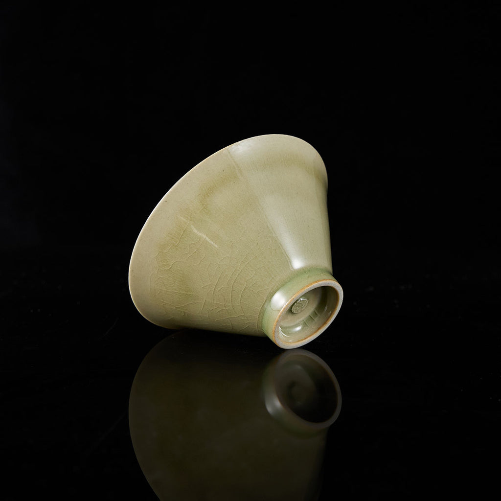 Handmade crackle-glaze Doulifa teacup with flared rim and small foot