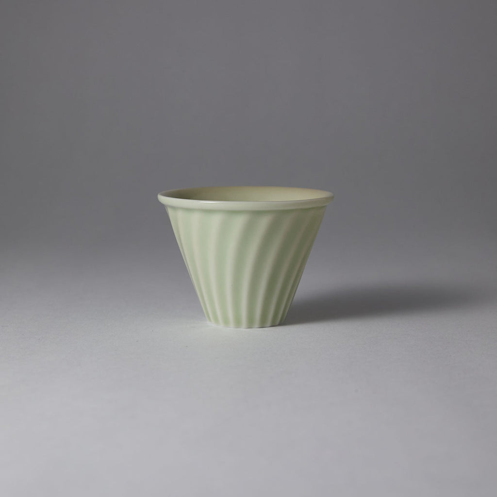 Hand-engraved wave motif teacup inspired by Song-Yuan ceramic art