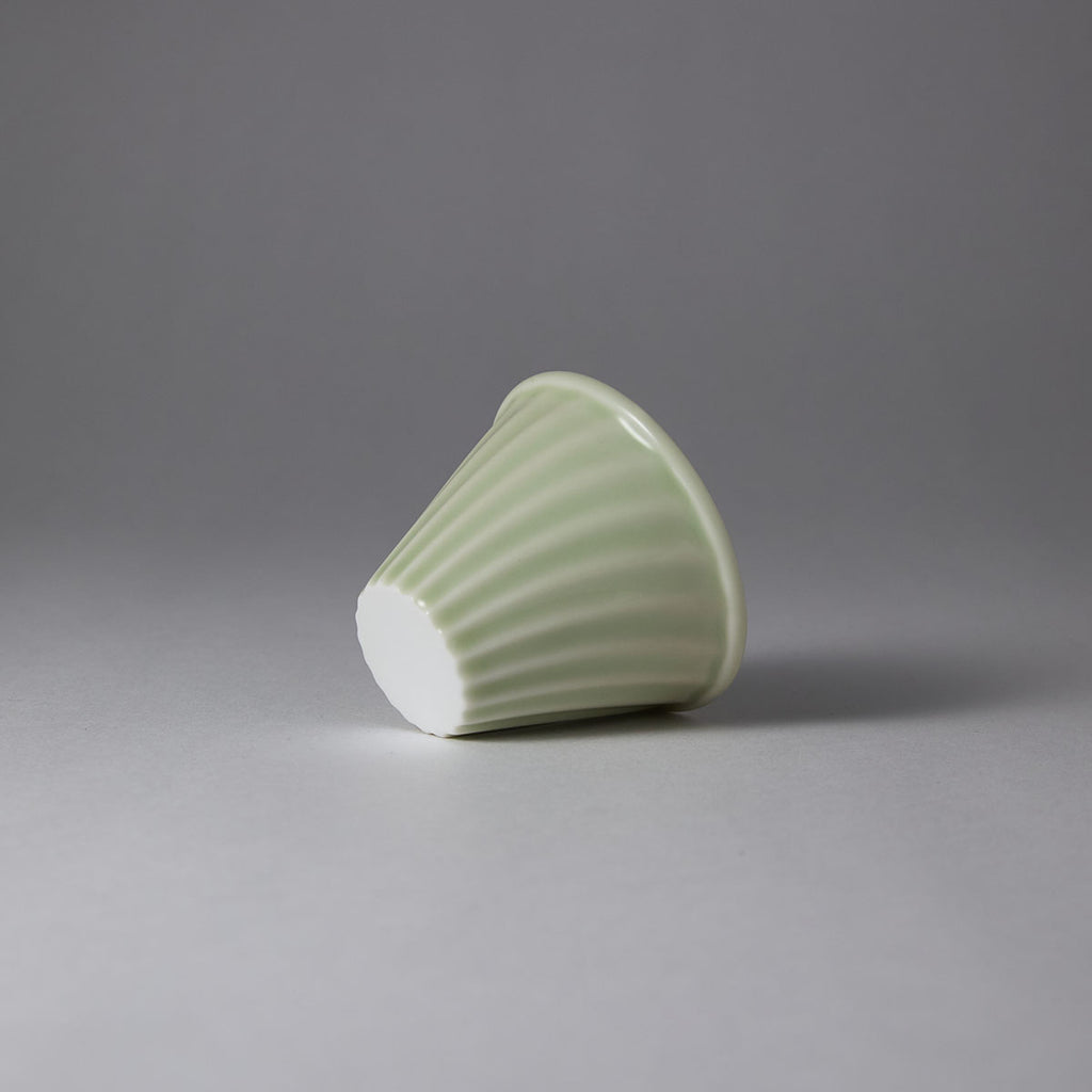 Hand-engraved wave motif teacup inspired by Song-Yuan ceramic art