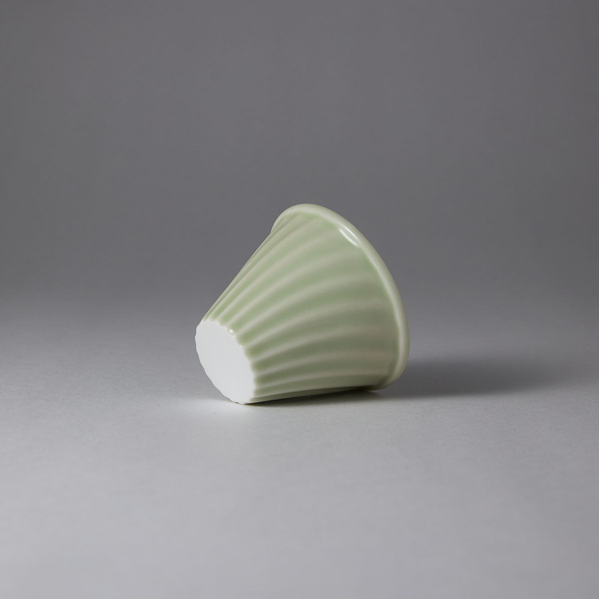 Hand-engraved wave motif teacup inspired by Song-Yuan ceramic art