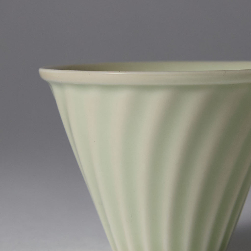 Hand-engraved wave motif teacup inspired by Song-Yuan ceramic art