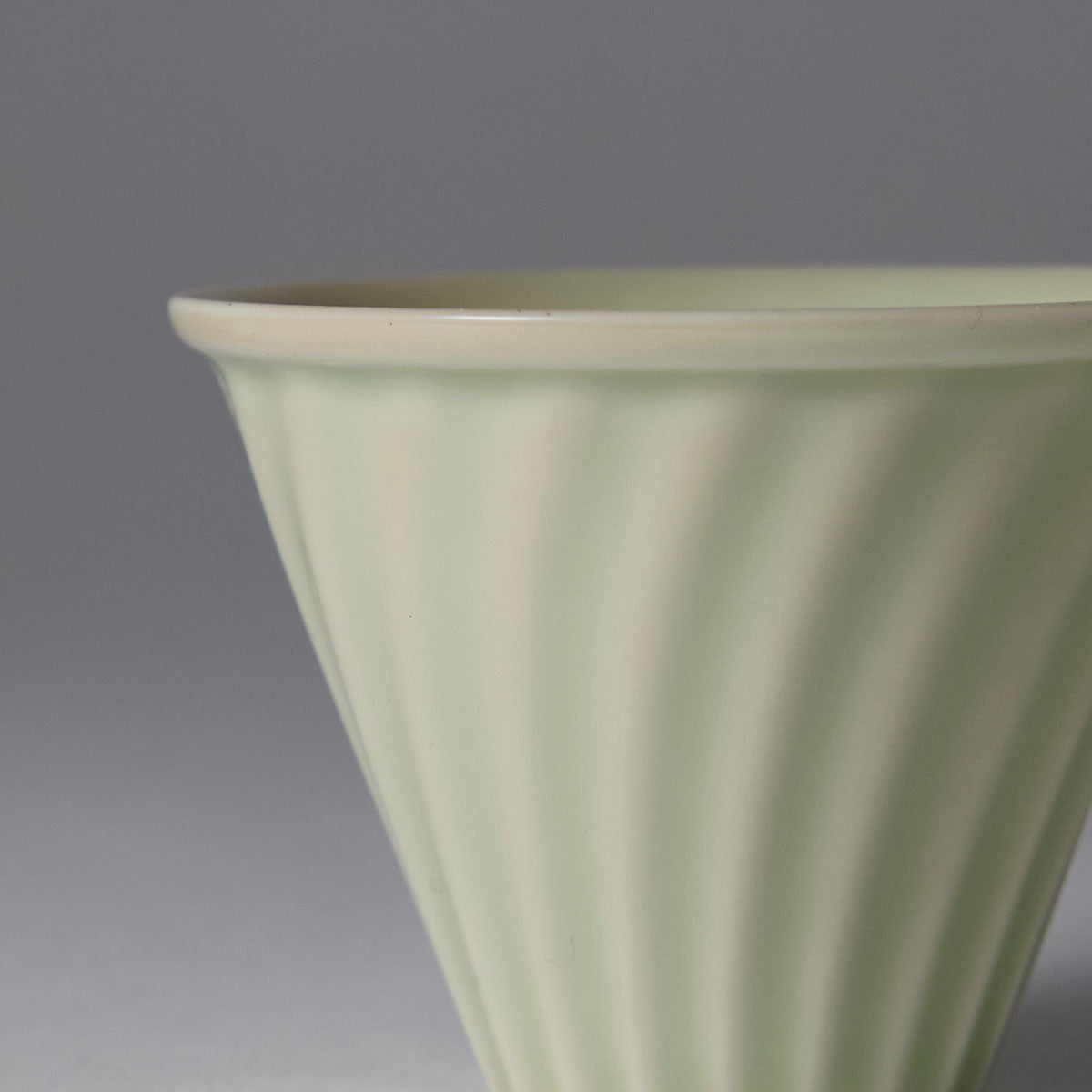 Hand-engraved wave motif teacup inspired by Song-Yuan ceramic art