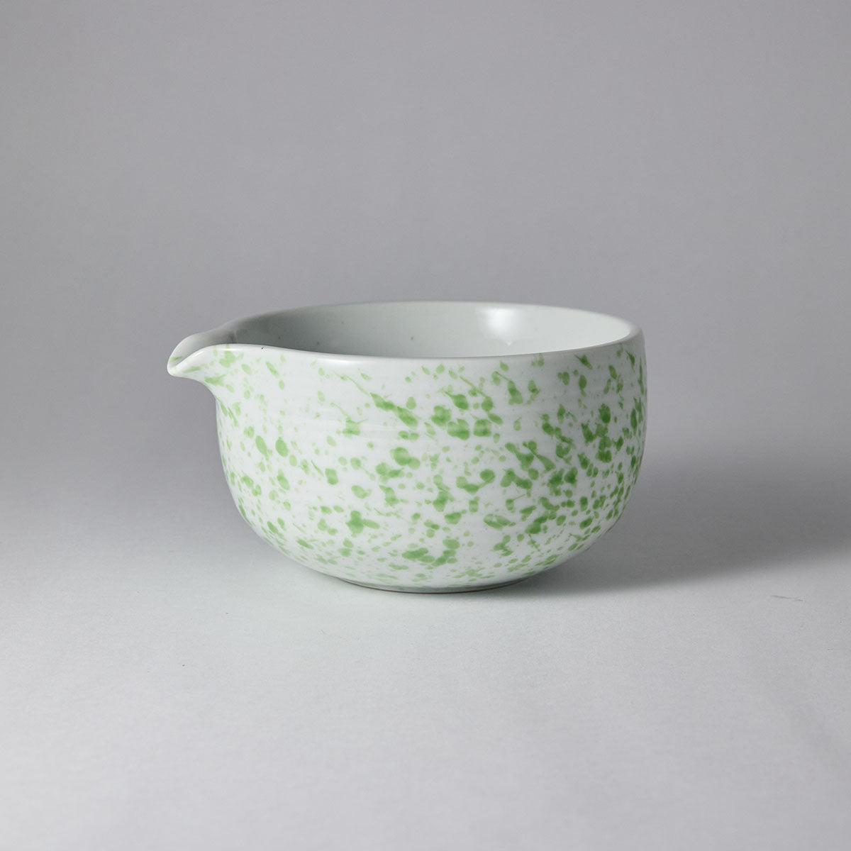 Galaxy-speckled matcha tea set with chawan, bamboo whisk, stand, and scoop