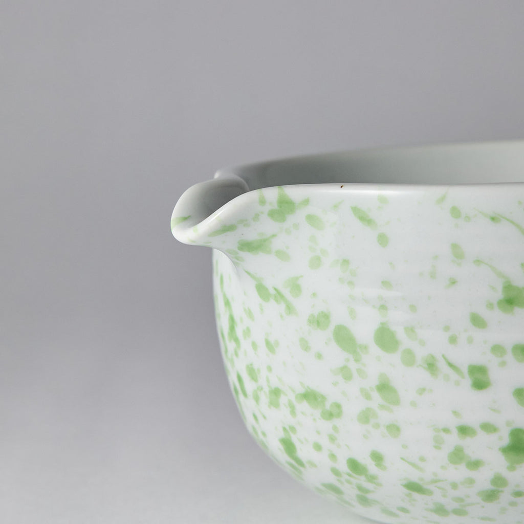 Galaxy-speckled matcha tea set with chawan, bamboo whisk, stand, and scoop