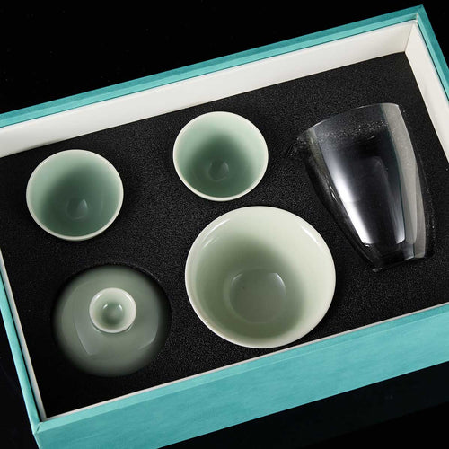 Chicken-heart cup and gaiwan celadon tea set with glass fair pitcher
