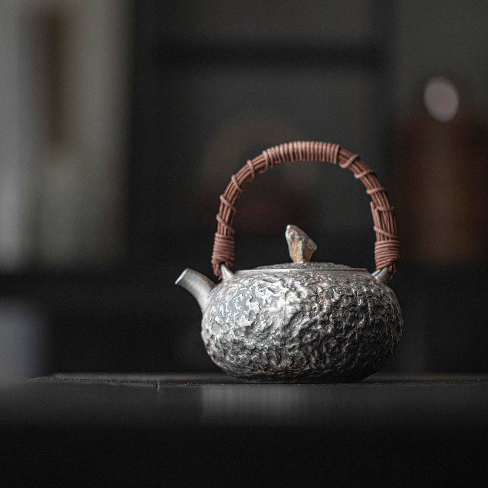 999 Pure Silver Hand-Hammered Chinese Teapot with Wood Handle side view handmade Chinese ceramic