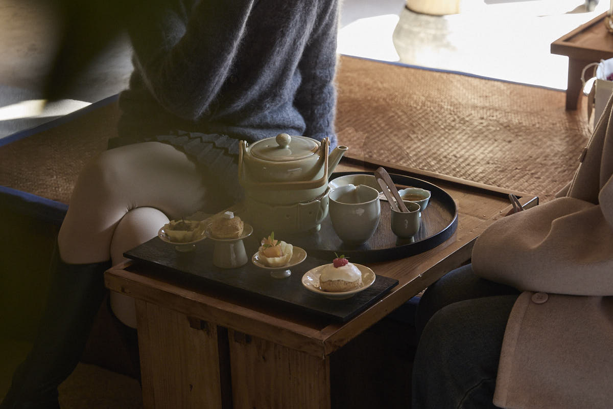 celadon gongfu tea set outdoor tea room scene two people sharing tea handmade chinese tea set for gathering