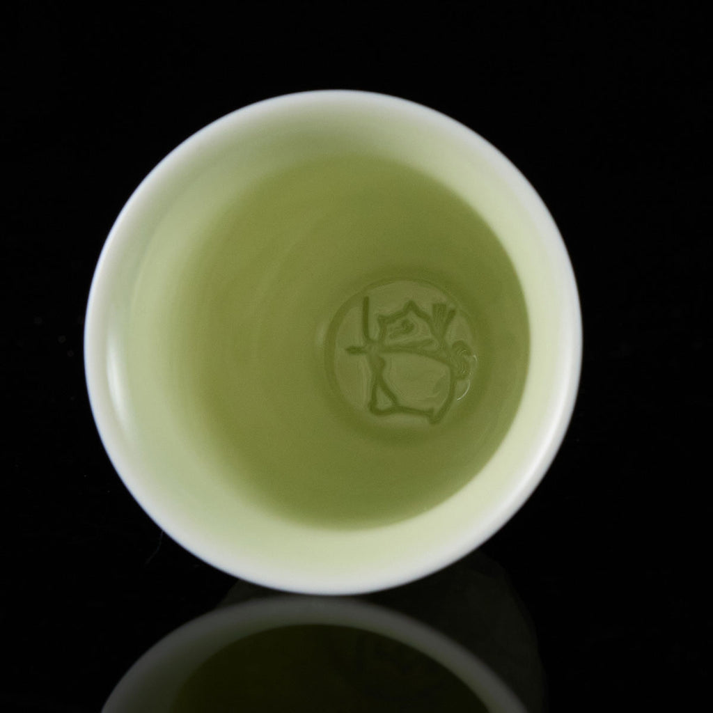 Ou Kiln celadon teacup rim detail handmade Chinese pottery