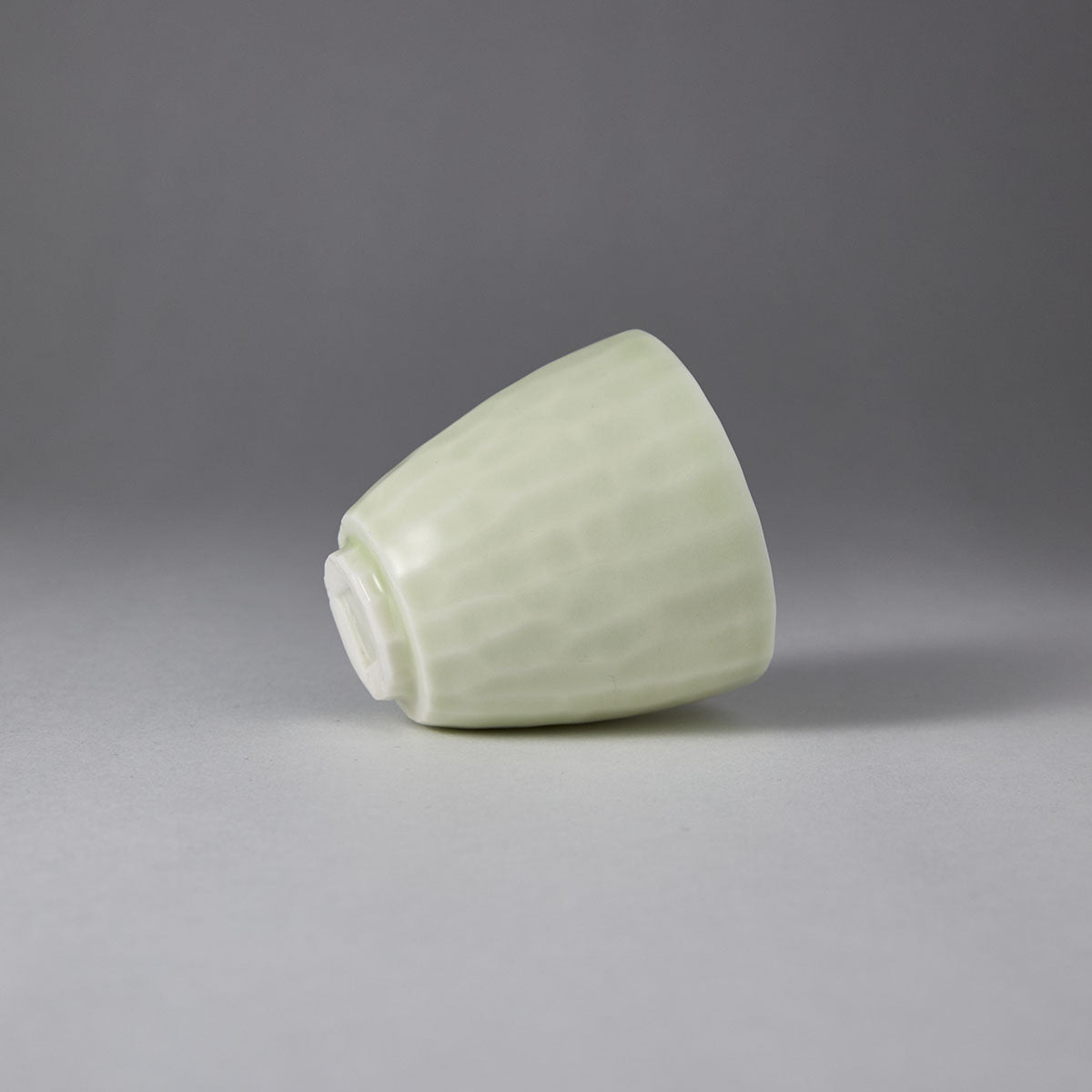 Ou Kiln Hammered Texture Celadon Teacup side view handmade Chinese ceramic