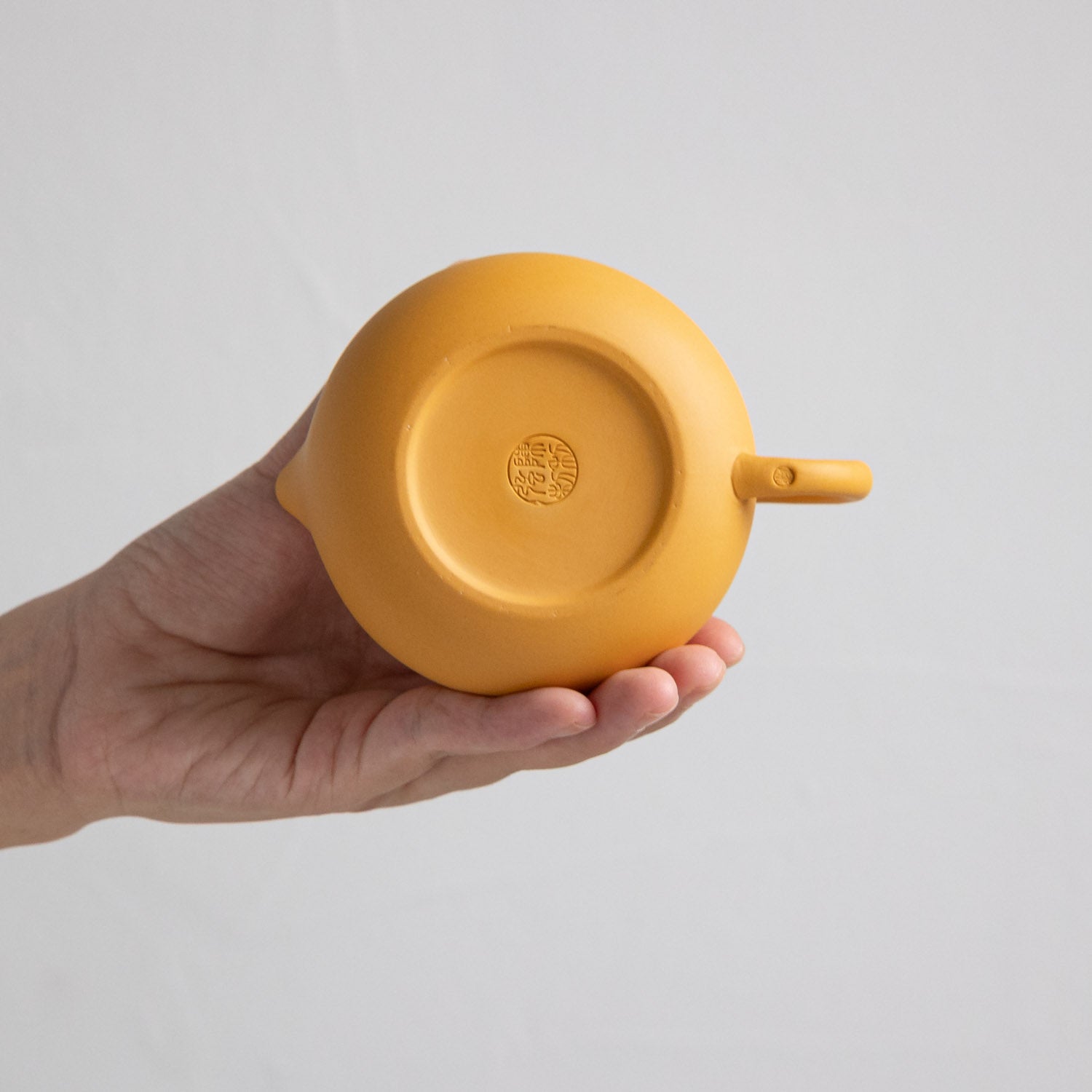 Xishi Yixing Yellow Chinese Teapot side view handmade Chinese ceramic